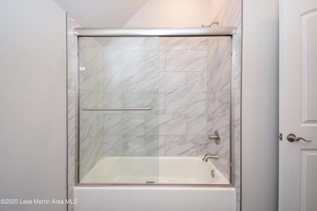 bathroom featuring enclosed tub / shower combo