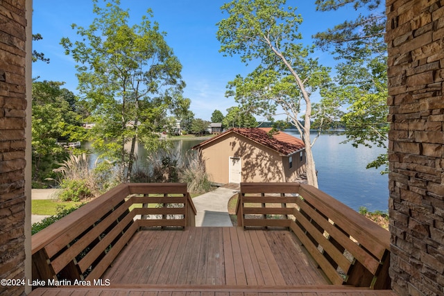 deck featuring a water view