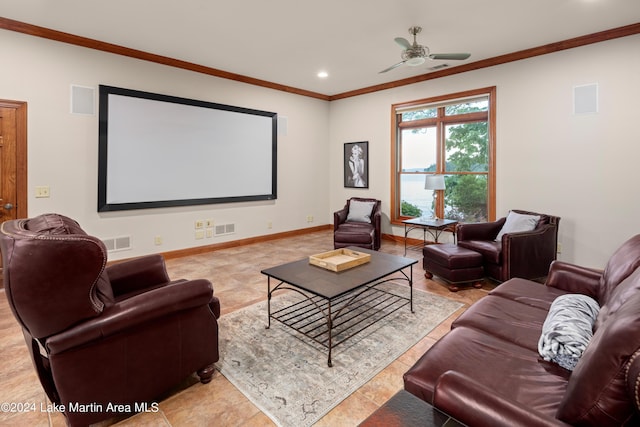 home theater featuring ceiling fan and ornamental molding