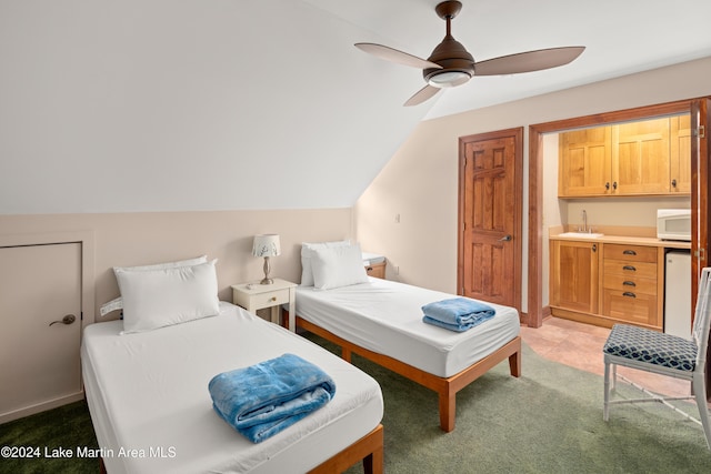 bedroom with light colored carpet, ceiling fan, and lofted ceiling