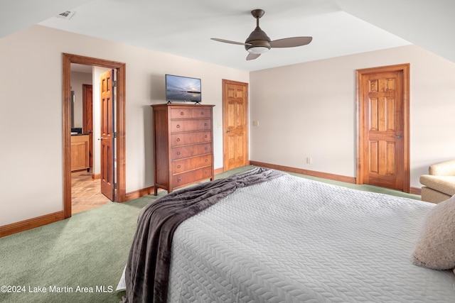 bedroom with light colored carpet and ceiling fan