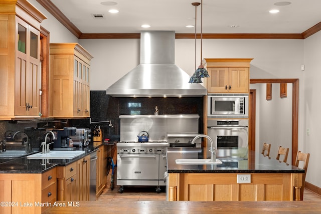 kitchen with decorative backsplash, appliances with stainless steel finishes, dark stone counters, ventilation hood, and pendant lighting