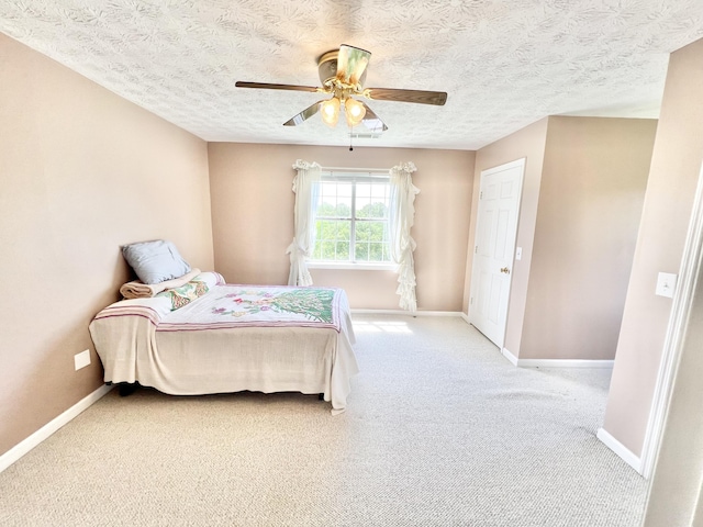 1370 County Road 759, Clanton, AL 35045 - carpeted bedroom with ceiling fan and a textured ceiling