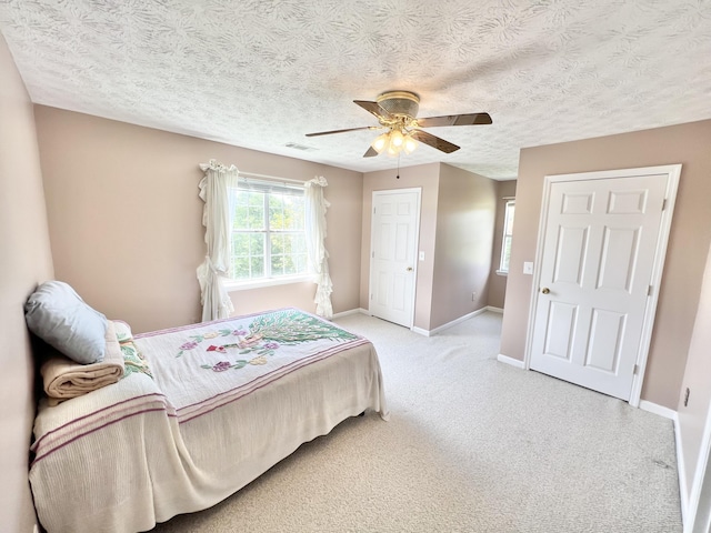 1370 County Road 759, Clanton, AL 35045 - bedroom featuring carpet, ceiling fan, and a textured ceiling