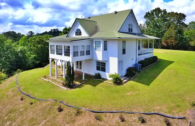 1370 County Road 759, Clanton, AL 35045 - rear view of property with a lawn and a metal roof