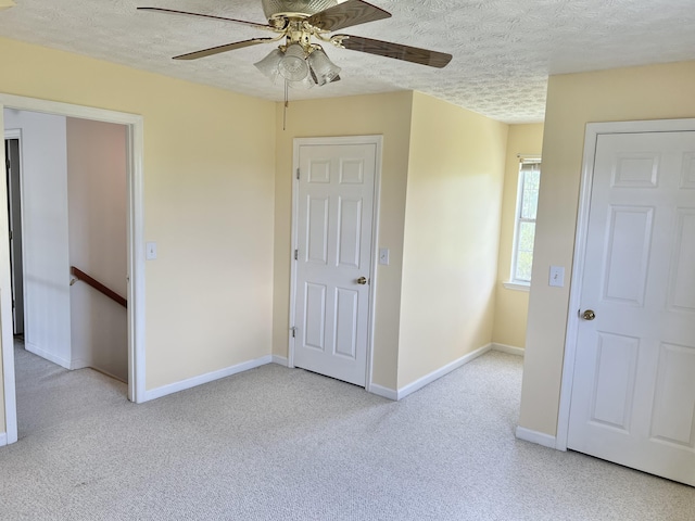 1370 County Road 759, Clanton, AL 35045 - spare room with a textured ceiling, carpet, and a ceiling fan