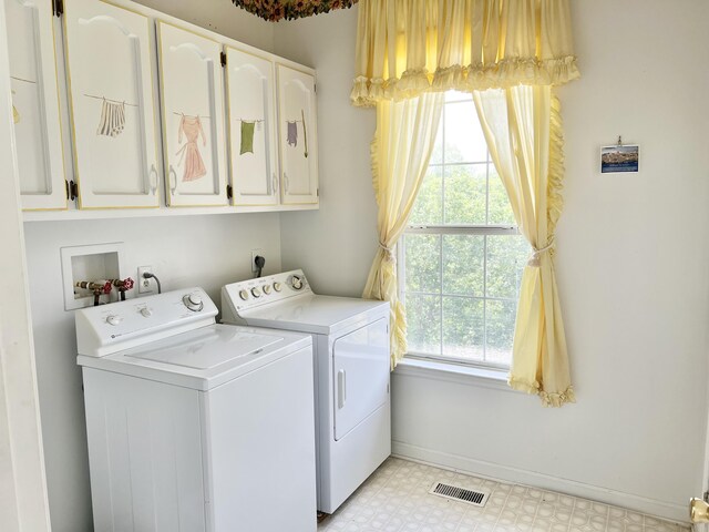 1370 County Road 759, Clanton, AL 35045 - laundry room featuring cabinet space, washer and clothes dryer, and light floors