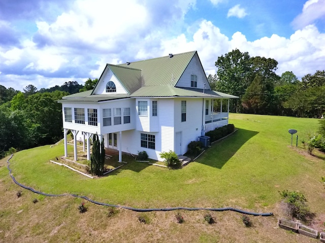 1370 County Road 759, Clanton, AL 35045 - back of house featuring a yard and a metal roof