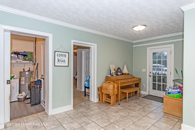 misc room with ornamental molding, a textured ceiling, water heater, light tile patterned floors, and washer / clothes dryer