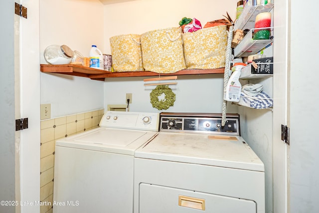 3464 Dobbs Rd, Alexander City, AL 35010 - laundry room with washer and clothes dryer