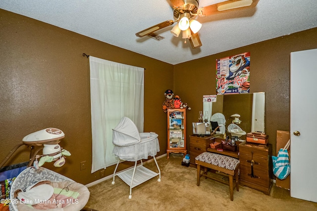 3464 Dobbs Rd, Alexander City, AL 35010 - living area with a ceiling fan, carpet, and a textured wall