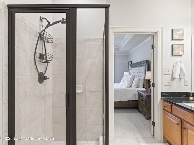 64 Stoneview Summit Ct Unit 5301, Dadeville, AL 36853 - ensuite bathroom featuring crown molding, connected bathroom, tile patterned flooring, vanity, and a shower stall