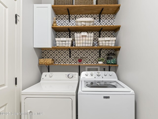 64 Stoneview Summit Ct Unit 5301, Dadeville, AL 36853 - clothes washing area featuring washing machine and dryer and cabinet space