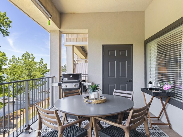 64 Stoneview Summit Ct Unit 5301, Dadeville, AL 36853 - balcony with outdoor dining area and a grill