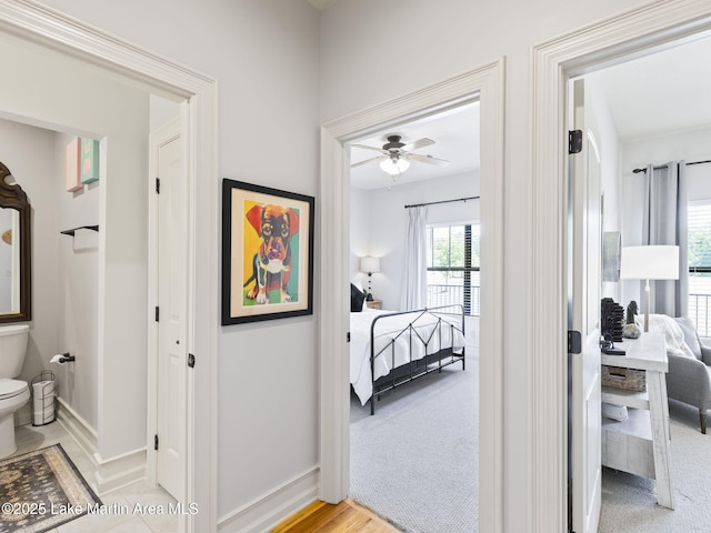 64 Stoneview Summit Ct Unit 5301, Dadeville, AL 36853 - corridor featuring baseboards and light colored carpet