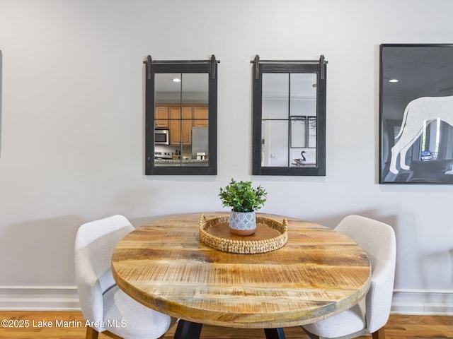 64 Stoneview Summit Ct Unit 5301, Dadeville, AL 36853 - dining room with baseboards and wood finished floors
