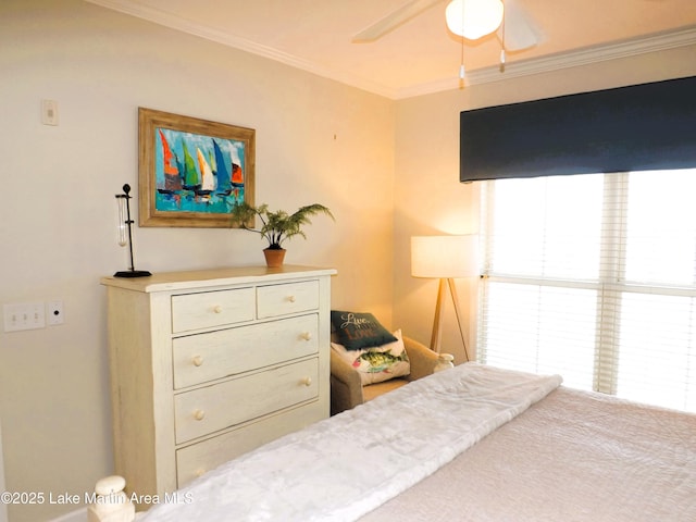 bedroom featuring crown molding