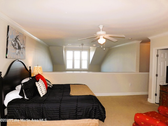 carpeted bedroom featuring a ceiling fan, baseboards, and crown molding