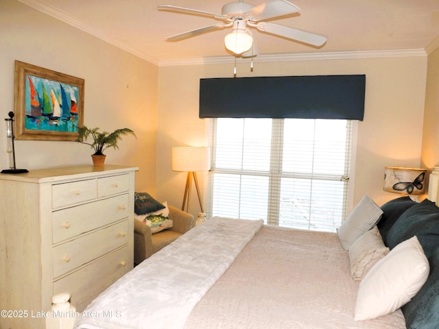 bedroom with ornamental molding and a ceiling fan