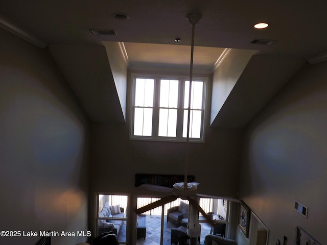 details featuring recessed lighting, visible vents, and crown molding