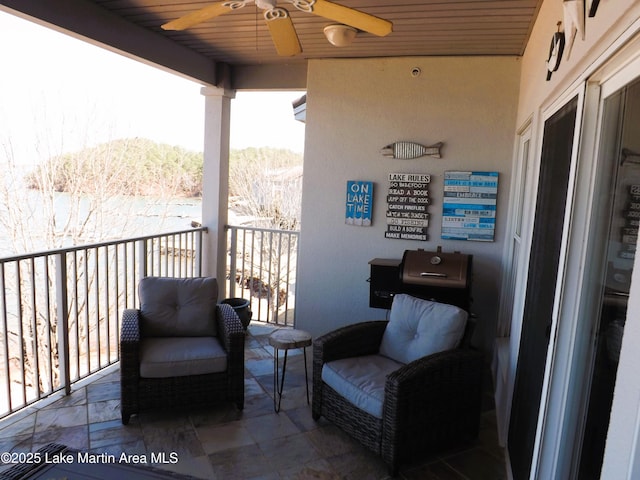 balcony featuring ceiling fan