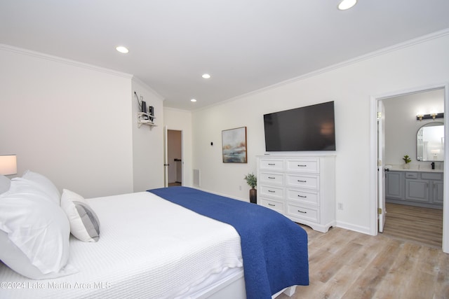 bedroom featuring recessed lighting, visible vents, ensuite bathroom, ornamental molding, and light wood-style floors