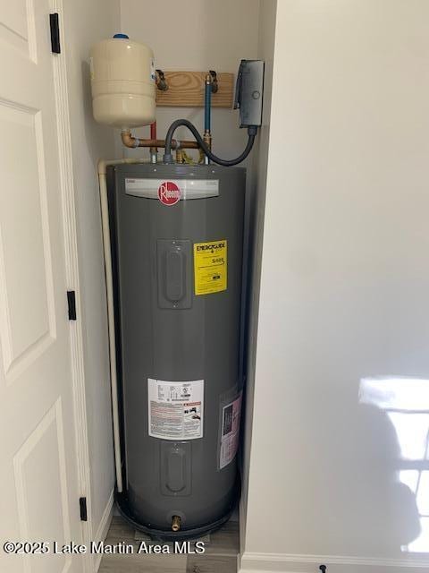 utility room with water heater