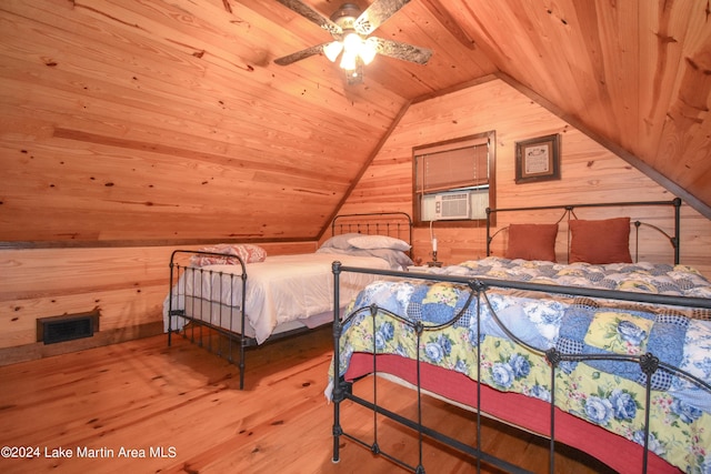 bedroom featuring light wood-type flooring, wood ceiling, vaulted ceiling, ceiling fan, and wood walls