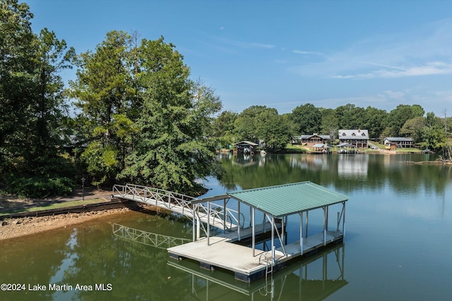 dock area with a water view