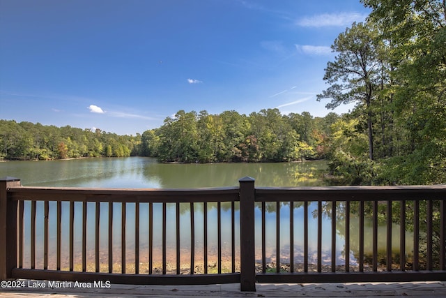 wooden terrace with a water view