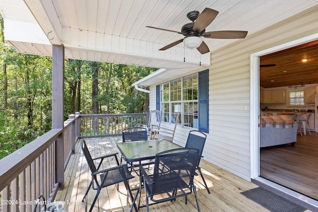 wooden deck with ceiling fan