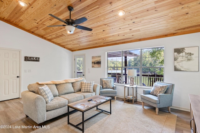 living room featuring wood ceiling, vaulted ceiling, ceiling fan, crown molding, and light hardwood / wood-style floors