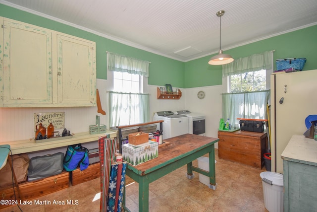 kitchen with ornamental molding, washing machine and dryer, decorative light fixtures, and white fridge