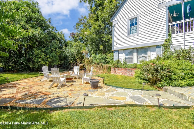 view of patio featuring an outdoor fire pit