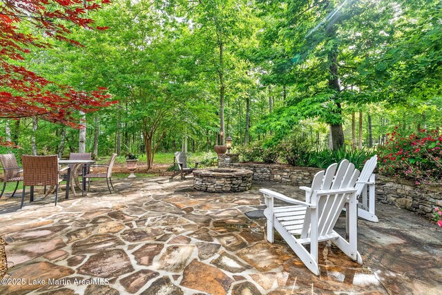 3408 Quail Cv, Opelika, AL 36801 - view of patio / terrace with a fire pit and outdoor dining area