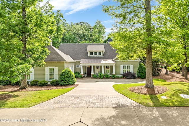 3408 Quail Cv, Opelika, AL 36801 - view of front of property featuring curved driveway and a front lawn
