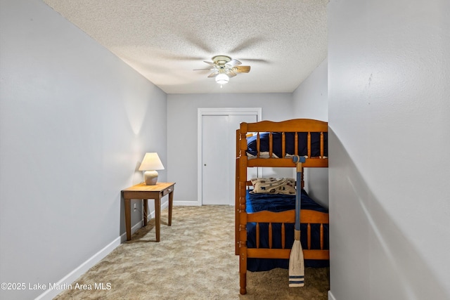 57 Lakeview Pt, Alexander City, AL 35010 - carpeted bedroom featuring a textured ceiling and ceiling fan
