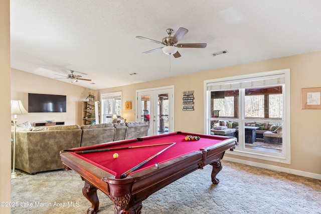 rec room with a wealth of natural light, french doors, carpet flooring, and visible vents