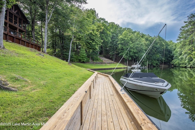 57 Lakeview Pt, Alexander City, AL 35010 - dock featuring a water view, a lawn, and a forest view