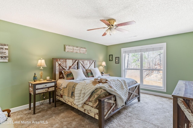 57 Lakeview Pt, Alexander City, AL 35010 - bedroom with carpet, a textured ceiling, and a ceiling fan