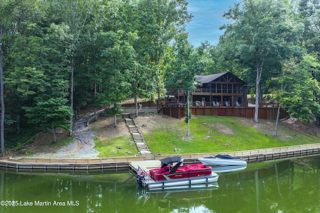 57 Lakeview Pt, Alexander City, AL 35010 - back of house with stairway, a yard, and a deck with water view