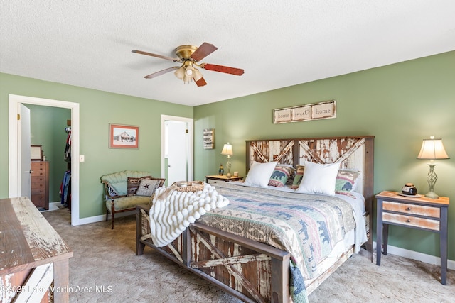 57 Lakeview Pt, Alexander City, AL 35010 - bedroom with carpet floors, a ceiling fan, and a textured ceiling