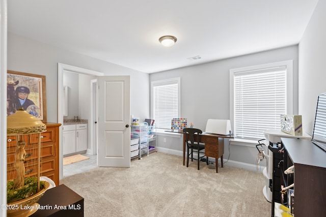 2409 Meadow Cove Rd, Auburn, AL 36832 - home office with light colored carpet and baseboards