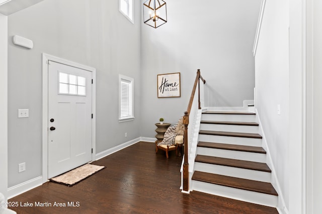 2409 Meadow Cove Rd, Auburn, AL 36832 - foyer with stairs, a towering ceiling, wood finished floors, and a chandelier