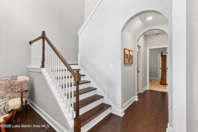 2409 Meadow Cove Rd, Auburn, AL 36832 - stairs featuring arched walkways and wood finished floors