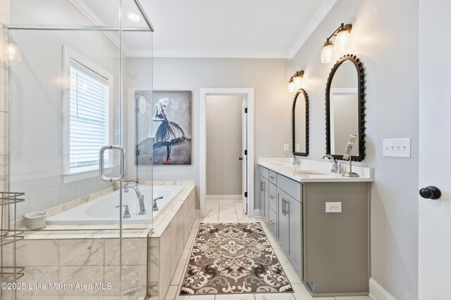 2409 Meadow Cove Rd, Auburn, AL 36832 - full bathroom featuring ornamental molding, double vanity, and a bath