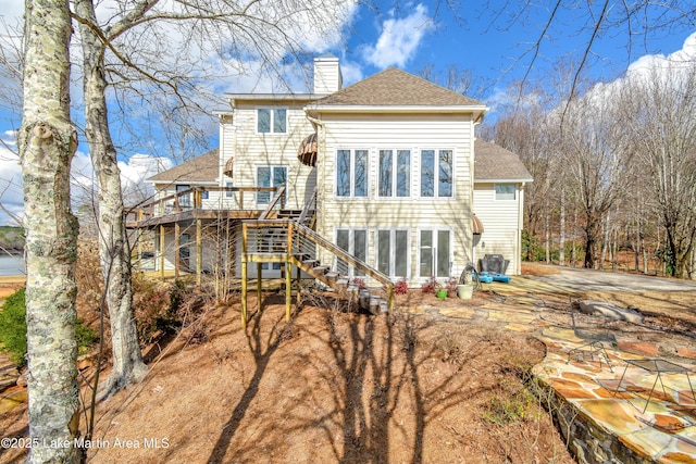 127 Ridge Crest Dr, Jacksons Gap, AL 36861 - back of house featuring a chimney, a wooden deck, stairway, a shingled roof, and a patio