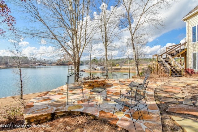 view of patio / terrace featuring a water view