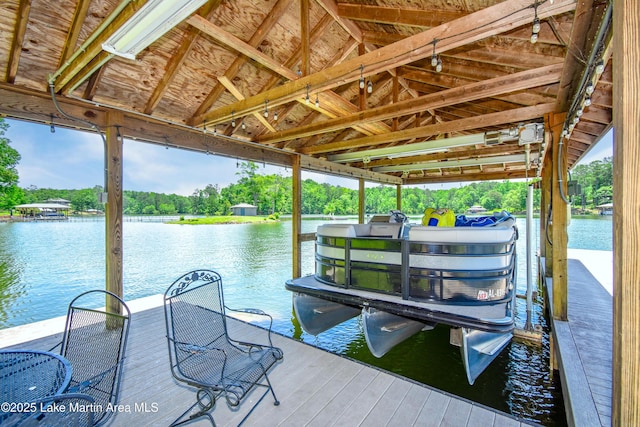127 Ridge Crest Dr, Jacksons Gap, AL 36861 - dock area with boat lift, a water view, and view of wooded area