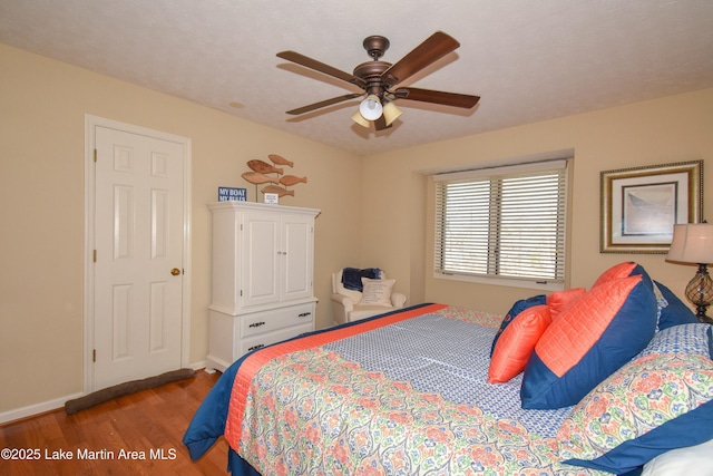 bedroom featuring ceiling fan and light wood-type flooring